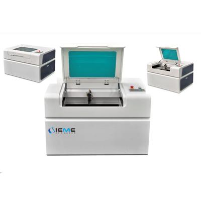 China 2021 10 Leading Water Cooled Mini CO2 Laser Cutter for sale