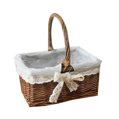 China Sustainable Manual Wicker Flower Container Basket Flower Storage Box Cosmetic Woven Storage Basket for sale