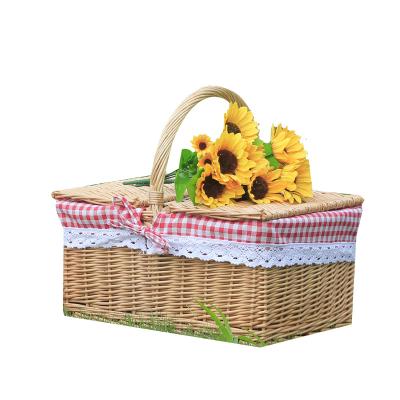 China Sustainable Rattan Handmade Woven Wicker Food Serving Tray Picnic Basket With Handles Picnic Basket With Lid for sale