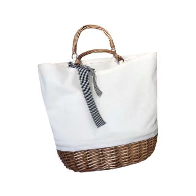 China Straw Bale Woven Walking Straw Woven Rattan Wicker Bag Viable Summer Hand Basket Water Bucket Bag Hand Basket Bag for sale