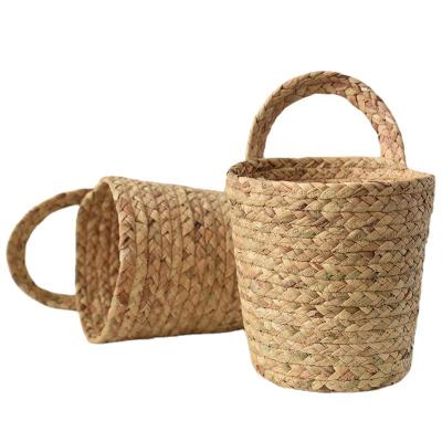 China Europe Straw Kitchen Basket Rope Storage Basket Kitchenware Wall Hanging Flower Weaving Finish Hanging Basket for sale