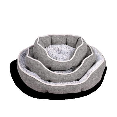 China Waterproof Small Size Comfortable Oval Luxury Dog Bed Soft Cuddle Plush Cat Bed Pet Supplies for sale