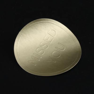 China Embossed Custom Label Printing Gold Foil Round Seal Adhesive Copper Paper Labels Embossed Logo Stickers for sale