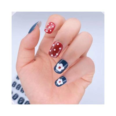 China 24 PCS flexibility in polka dot printing nail patch glue short detachable jelly can wear nail patches for sale