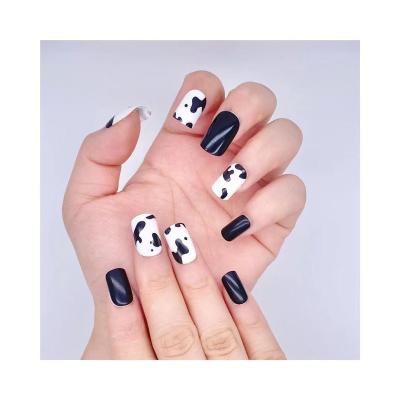 China Custom Made High Quality Stylish Black Cow Print Fake Alice Flexibility Square Nails for sale