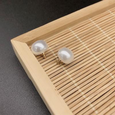 China ABS Modern Bright Imitation Pearl Pendant Steamed Bun With Head Diy Jewelry Clothing Accessories Copper Decorative Pendant for sale