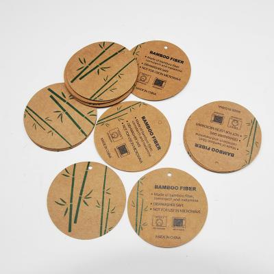 China Waterproof Kraft Cardboard Hang Tag Printed Logo Paper Elastic Rope Twine Swing Clothing Hang Tags for sale