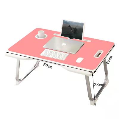 China Foldable Plastic Portable Adjustable Laptop Stand Floor Bed Computer Desk Folding Table for sale