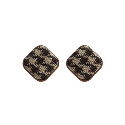 China Hard Houndstooth Woven Female High-end Sense Of Autumn And Winter Hong Kong Style Light Luxury Retro Earrings for sale