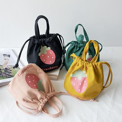 China Custom Cute Strawberry Canvas Drawstring Tote Bags Barrel Shape Kids Picnic Handbag Canvas Lunch Box Bag High Quality for sale