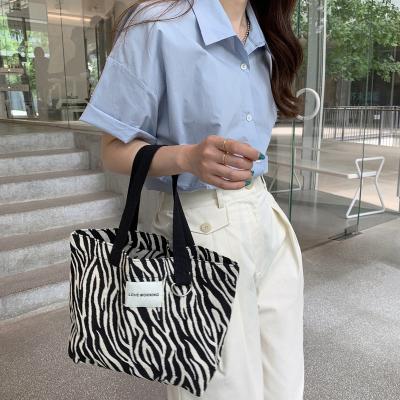 China Fashionable Copy Diamond Plaid Tote Bag High Quality Zebra Pattern Tote Bag New Design All-Match Fashionable Bento Bag Women for sale