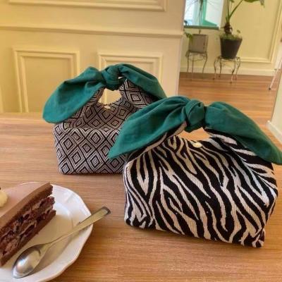 China Latest Design High Quality Japanese Style Bento Bag Thicken Polyester Zebra Bowknot Pattern Cotton Canvas Lunch Cooler Bag for sale