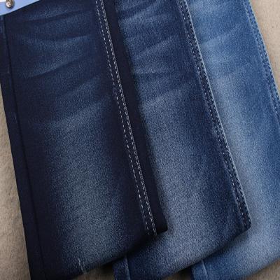 China Faux Stretch Heavy Peach Knitted Soft Denim Fabric Fabric For Winter Jeans for sale