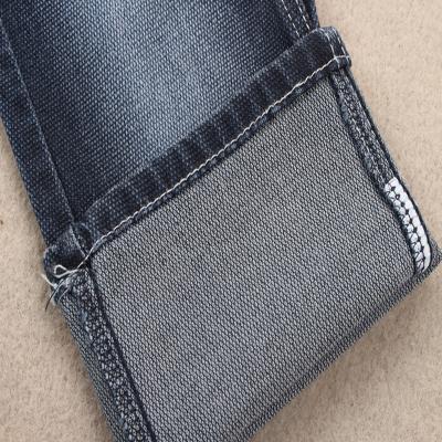 China 9.2 oz faux knitted denim dobby polyester spandex jeans special weave fabrics for kids jeans and denim shirt for sale