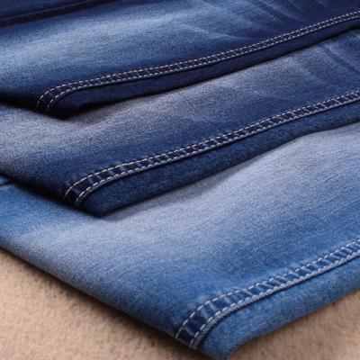 China Wholesales stretch roving indigo blue jeans denim fabric prices for sale