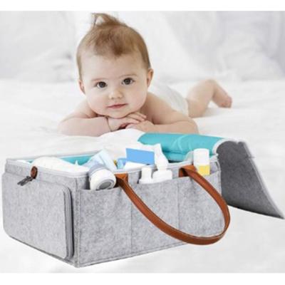 China Newborn Portable Baby Carrier Bag Diaper Bag Water Resistant Baby Care Container Diaper Bag Handbag Foldable Nursery Storage Bag for sale