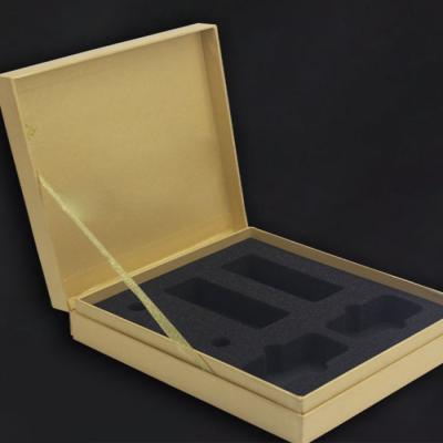 China Customized Biodegradable Packaging Box Black Foam Sponge Natural Brown Color Box With Ribbon Closure for sale