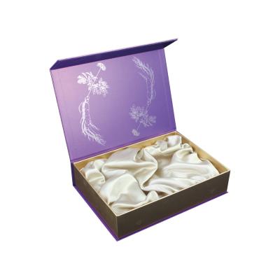 China Biodegradable Luxury Custom Skin Care Kit Magnetic Cosmetic Gift Box With Satin Inlay Silk Insert for sale