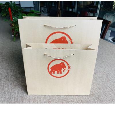 China Recycled Biodegradable Materials Kraft Paper Clothing Shopping Paper Bag Craft Thick Craft Packing Bag With Your Own Brand for sale