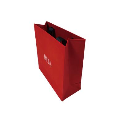 China Customized Luxury Durable Recycled Materials Paper Bag Gift Shopping High Quality Paper Bag With Ribbon for sale