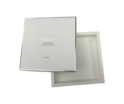 China Custom Luxury Biodegradable Two Pieces Packaging White Box Cardboard Set Mask Skin Care Underwear Silver Foiled Logo for sale