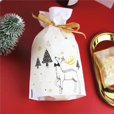 China Recyclable In Waterproof Eco-friendly Cartoon Animal Christmas Drawstring Candy Bags Gift Packing Bag Eco-friendly Cartoon Deer Custom Stock for sale