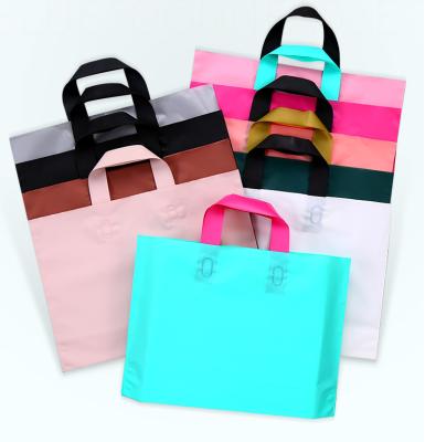 China Recyclable Plastic Packaging Bag Custom Logo Thickened Gift Handbag Frosted Logo Custom Bag Clothing Store Shopping Bags for sale