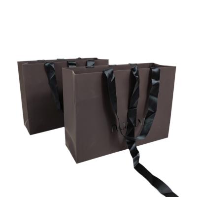 China Recyclable Luxury Paper Shopping Bag Shopping Gift Promotion Recyclable Paper Bag With Handle for sale