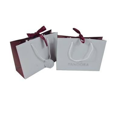 China Wholesale Custom Logo Luxury Shopping Paper Bag Recyclable for sale