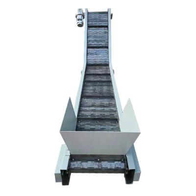 China Stainless Steel Hopper Belt Conveyor Steel Slat Heat Resistant Unloading Inclined Belt Conveyor for sale