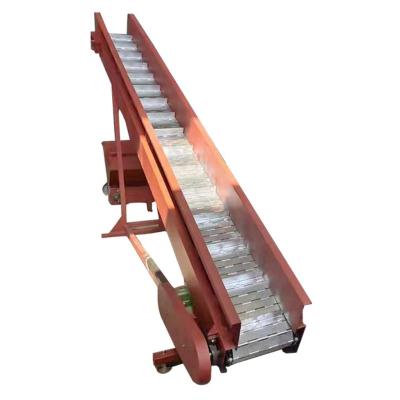 China Heat Resistant Industrial 50kg Bags Loading Stainless Steel Slat Belt Conveyor for sale