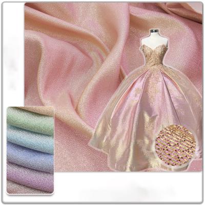 China Popular Tear-resistant Lurex Silk Fabric Double Color Shine Change Stage Wedding Dress Fabric Exquisite Gradual Stain Polyester Fabric for sale