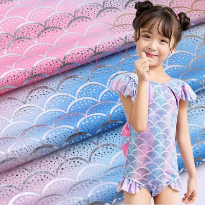 China New Stretch Design Fish Scales Water Ripple Print Silver Foil Spandex High Elastic Swimsuit Holographic Fabric for sale