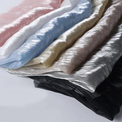 China Breathable Ready to Ship Crystal Silk Wave Crease Lurex Luminous Silk Fabric Organza Satin Polyester Nylon Fabric for sale