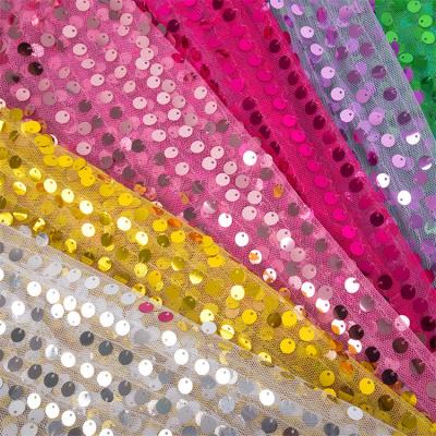 China Wholesale Anti-Static Glitter Fabric Mesh Density Paillette Sequin Fabric Polyester Stage Costume Foil Embroidery Veil Order for sale