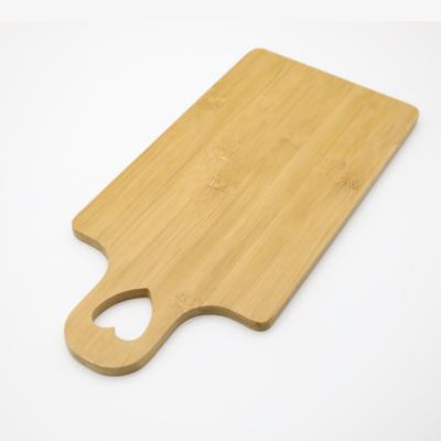 China High Quality Grocery Store Sustainable Bamboo Cutting Plate Serving Size Bamboo Cutting Board With Handle for sale