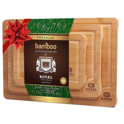 China Sustainable Natural Cutting Board Kitchen Cooking Mini Multifunctional Bamboo Chopper Cutting Board for sale