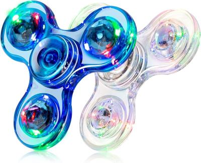 China FLASHING Children's sensory transparent rotator LED lighting transparent toy fingertip gyroscope for sale