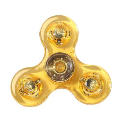 China FLASHING Children's sensory transparent rotator LED lighting transparent toy fingertip gyroscope for sale