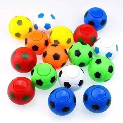 China Kids Play Toys Spinning Top Newest Children Educational Toys Mini Finger Football Spinning Top Toy For Kids for sale