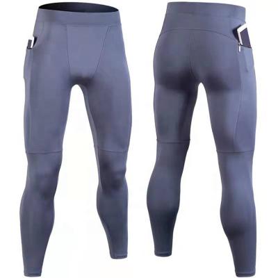 China Anti-Wrinkle Fitness Pants Quickly Stretch Bodybuilding Dry Pants High For Men's Night Running Mid Waist Pants for sale