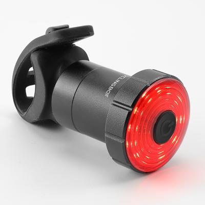 China CNC frodted led rechargeable bicycle tail light aluminum alloy automatic sensing bike tail lights for sale