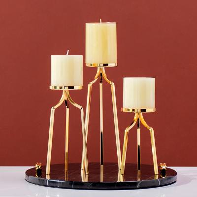 China Gold Rustic Modern Elegant Candle Holder For Home Decoration Alloy Candle Holder for sale