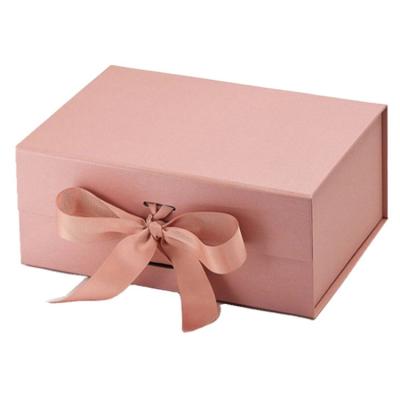 China Eco-friendly Recyclable Modern Luxury Sliver Bowknot UV Printing Foil Stamping Separate Sticker Lid Magnetic Bottom Gift Paper Box for sale