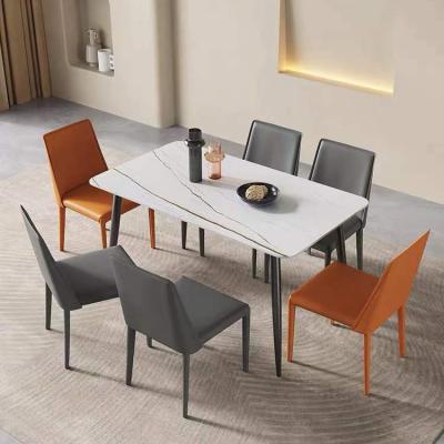 China Rectangle Extendable Modern Ceramic Top White Dining Table With 4 Chairs Carbon Steel Base 4 Person Dining Table for sale