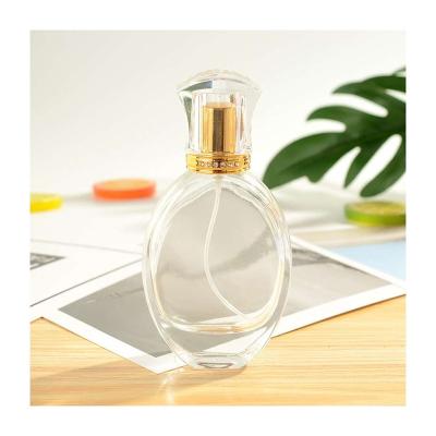 China Wholesale Custom Lucency Luxury Glass Spray 50ml Circular Empty No Color Perfume Bottle for sale