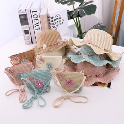 China Brim Straw Hat Girl's Outdoor Summer Parasol Straw Sun Hat Bag Flower Set Dobby Summer Children's Hat Large for sale