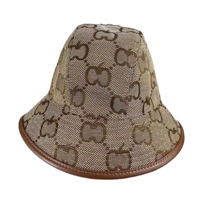 China Outdoor Hats With Logo Embroidered Apple Pattern Cotton Bucket Hat Designer Custom GU Hat CCI for sale