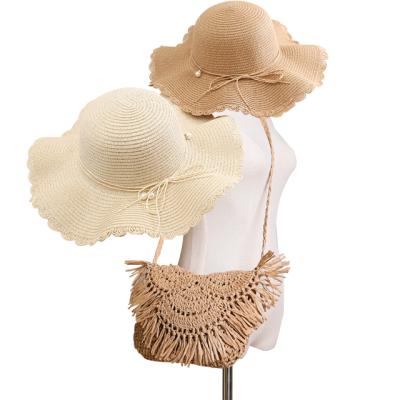 China Dobby Summer Straw Bag And Hat Wavy Side Brim Straw Hat Children Adult Sun Beach Woven Protective Hat Large for sale