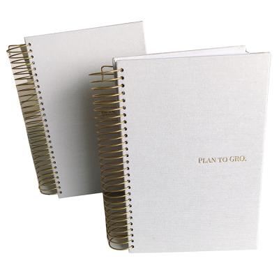 China Custom Weekly Daily Planner Notebook Printing Gold Spiral 2021-2022 A4 A5 Free Sample Hardcover Book for sale